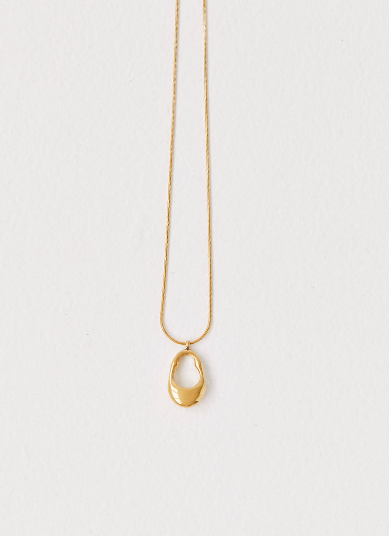 Womens Blissful Necklace in the colour Gold in front of a light grey background