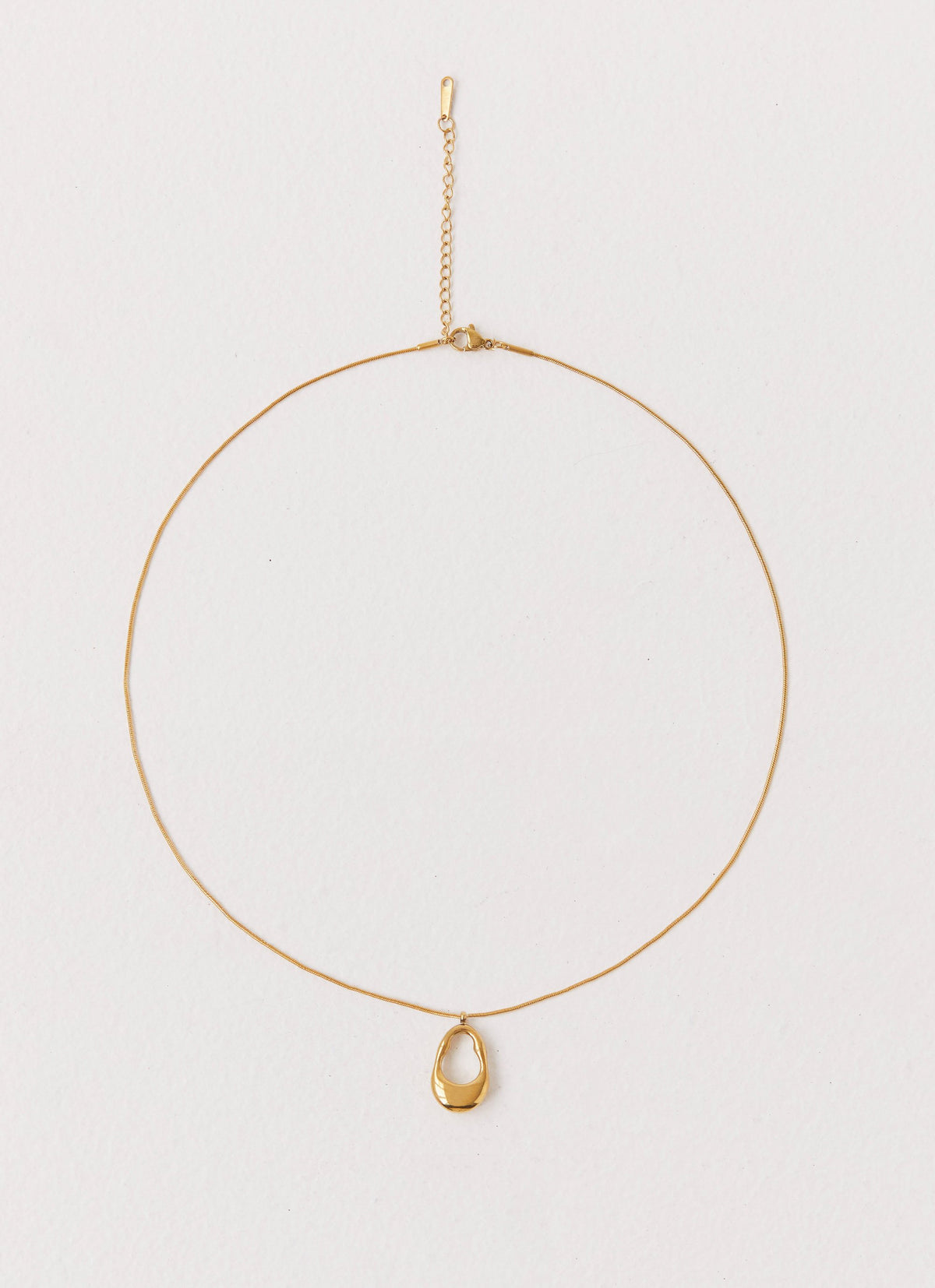 Womens Blissful Necklace in the colour Gold in front of a light grey background