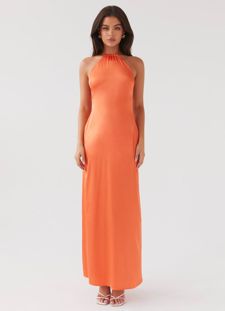 Womens Melody Day Halterneck Maxi Dress in the colour Tangerine in front of a light grey background